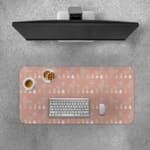 Infidu Beige Desk Mat with a subtle pattern of small shapes or icons on a soft beige background. Desk Pad with Keyboard and Mouse on top of the desk pad