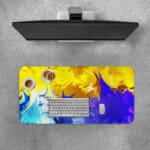 Infidu Abstract Desk Pad with yellow, blue, and green colors in flowing patterns on a vibrant background. Desk Pad with Keyboard and Mouse on top of the desk pad