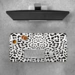 Infidu Black Leopard Print Desk Pad features a bold black leopard print pattern on a white background, offering a modern and stylish look. Desk Pad with Keyboard and Mouse on top of the desk pad