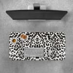 Infidu White Leopard Print Desk Pad features black spots on a white background, creating a classic and stylish leopard print design. Desk Pad with Keyboard and Mouse on top of the desk pad