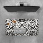 Infidu White Leopard Print Desk Pad features black spots on a white background, creating a classic and stylish leopard print design. Desk Pad with Keyboard and Mouse on top of the desk pad