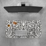 Infidu White Leopard Print Desk Pad features black spots on a white background, creating a classic and stylish leopard print design. Desk Pad with Keyboard and Mouse on top of the desk pad