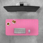Pink diagonal striped desk pad with a soft and pastel design, featuring thin pink stripes on a light background. Desk Pad with Keyboard and Mouse on top of the desk pad