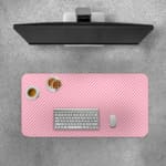 Light pink diagonal striped desk pad with a soft and pastel design, featuring thin pink stripes on a light background. Desk Pad with Keyboard and Mouse on top of the desk pad