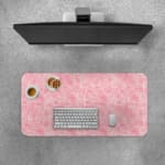 Infidu Pink Geometric Desk Mat with subtle geometric patterns on a pink background. Desk Pad with Keyboard and Mouse on top of the desk pad