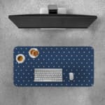 Blue and white polka dot desk pad with a classic pattern design. Desk Pad with Keyboard and Mouse on top of the desk pad