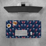 Infidu Red Strawberry and Blue Leaf Desk Mat with a dark blue background and a vibrant pattern of red strawberries and blue leaves. Desk Pad with Keyboard and Mouse on top of the desk pad