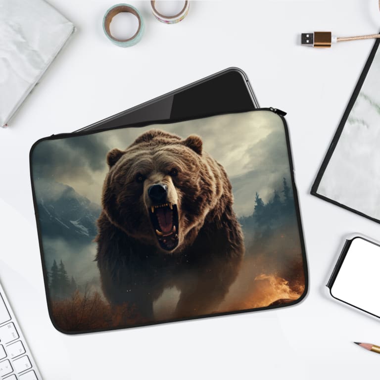 Infidu Roaring Bear Laptop Sleeve with a brown bear in a misty forest design, featuring shades of blue and gray for a rugged look. laptop sleeve kept on a plain white background