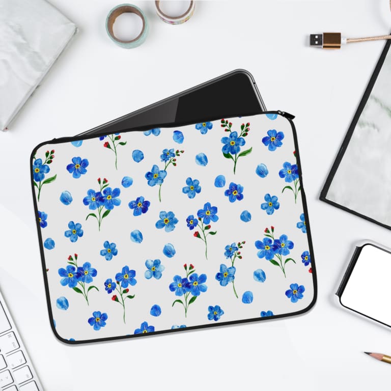 Infidu Blue Floral Pattern Laptop Sleeve with Green Leaves - white background with blue flowers and green leaves. laptop sleeve kept on a plain white background
