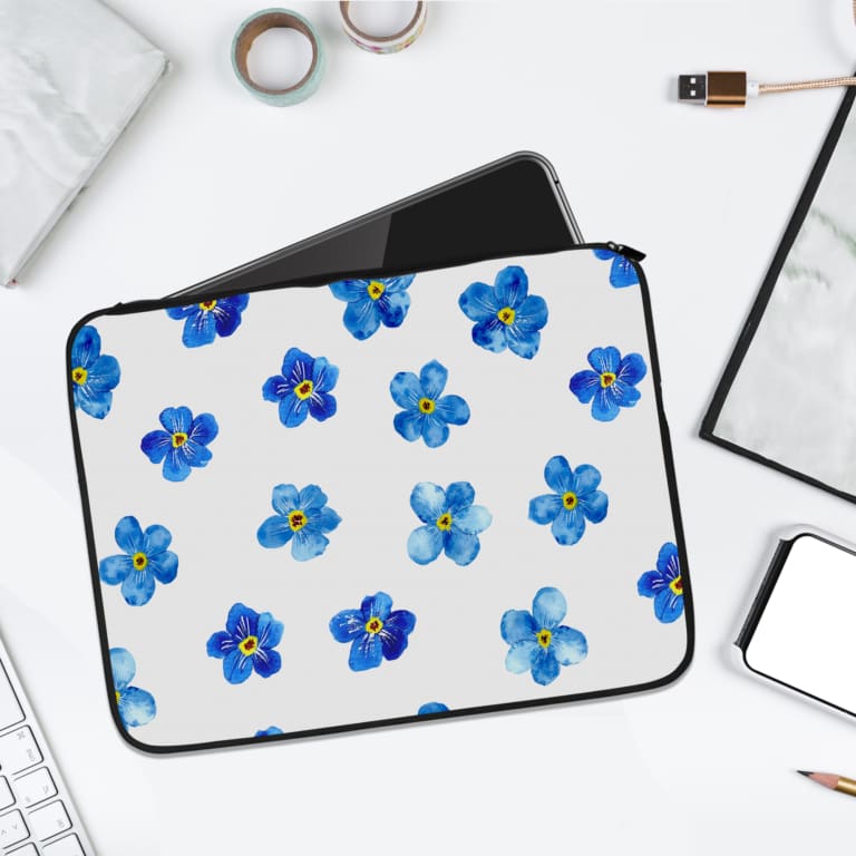 Infidu Blue Flowers with Yellow Centers Laptop Sleeve - White background with blue flowers and yellow centers, fresh and vibrant design. laptop sleeve kept on a plain white background