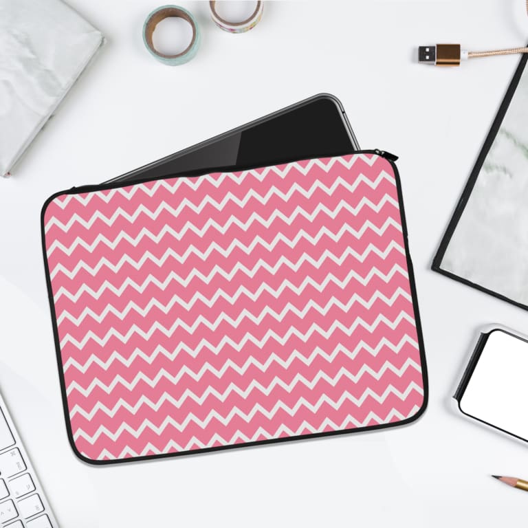 Infidu Pink Chevron Zigzag Pattern Laptop Sleeve with white zigzag design on light pink background, offering stylish laptop protection. laptop sleeve kept on a plain white background