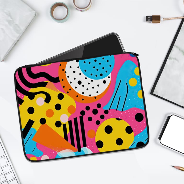 Infidu Vibrant Abstract Laptop Sleeve with bold colorful patterns and geometric shapes. laptop sleeve kept on a plain white background