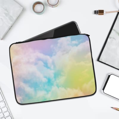Infidu Dreamy Pastel Cloud-Inspired Laptop Sleeve with soft pastel colors blending pink, blue, yellow, and green for a calming look. laptop sleeve kept on a plain white background