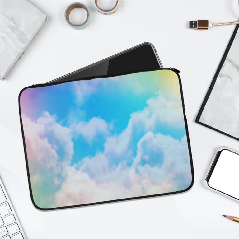 Infidu Dreamy Cloud Gradient Laptop Sleeve featuring soft shades of blue, pink, and white, resembling a serene sky with fluffy clouds. laptop sleeve kept on a plain white background