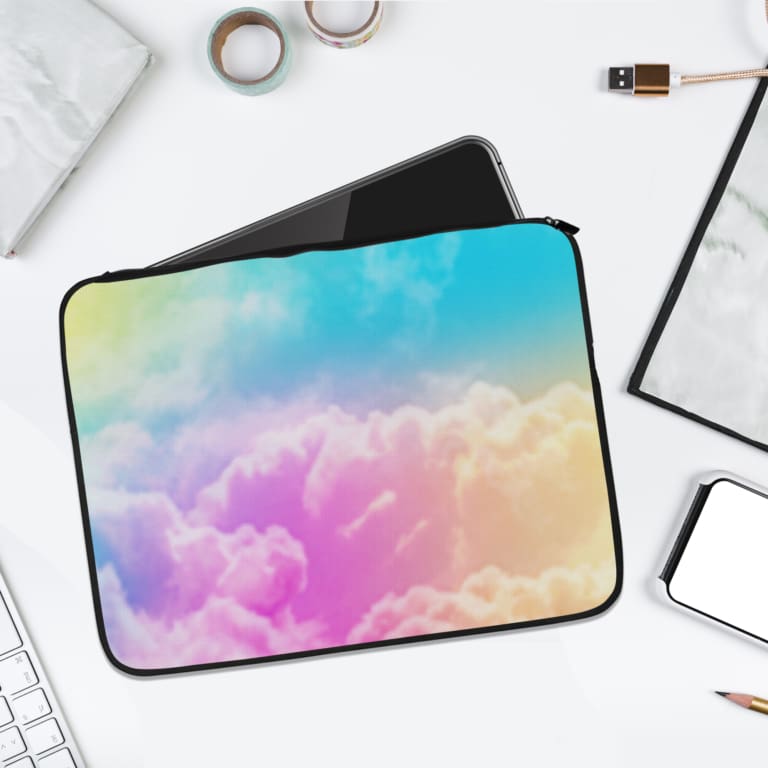 Infidu Dreamy Cloud Gradient Laptop Sleeve featuring soft shades of blue, pink, and yellow, resembling a serene sky with fluffy clouds. laptop sleeve kept on a plain white background