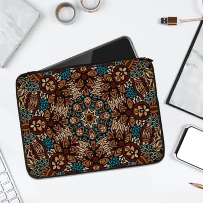 Infidu Mandala Pattern Laptop Sleeve featuring floral and geometric designs in brown, blue, beige, and white. laptop sleeve kept on a plain white background