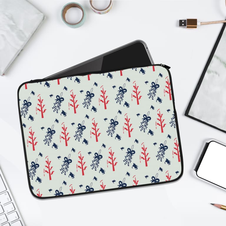 Infidu Red Tree & Blue Ribbon Laptop Sleeve with blue leaves design on a white background. laptop sleeve kept on a plain white background