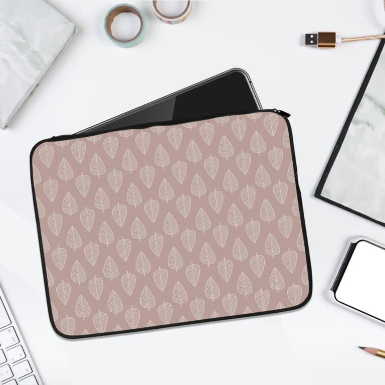 Infidu Beige Laptop Sleeve with subtle white leaf pattern, perfect for protecting your laptop in style. laptop sleeve kept on a plain white background