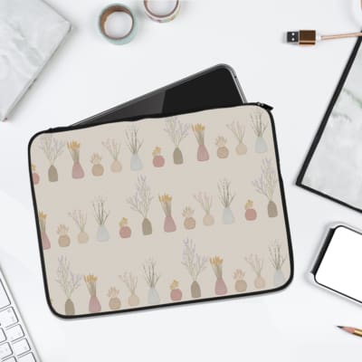 Infidu Light Grey Laptop Sleeve with minimalist plant design in muted tones, offering stylish protection for your laptop. laptop sleeve kept on a plain white background