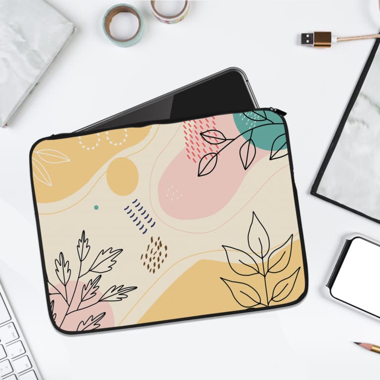 Minimalistic floral laptop sleeve with soft pastel shades of cream, pink, beige, and teal, featuring simple plant outlines for an elegant look. laptop sleeve kept on a plain white background