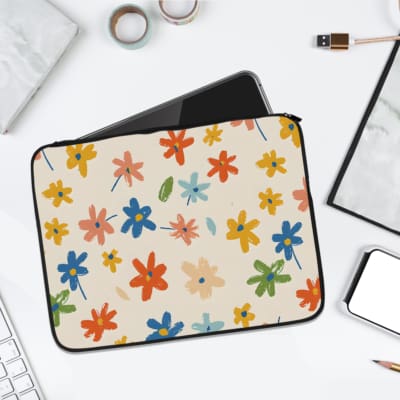 Infidu White Laptop Sleeve with colorful floral design featuring multi-colored flowers in orange, blue, green, and yellow. laptop sleeve kept on a plain white background