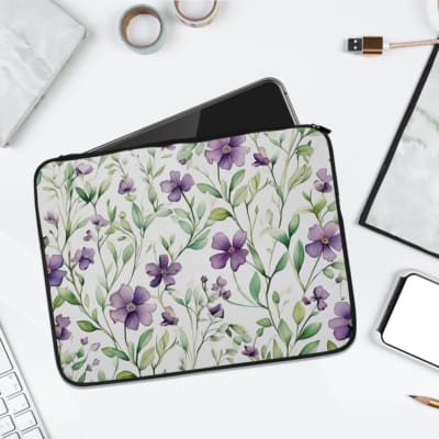 Infidu Floral Purple & Green Design Laptop Sleeve with vibrant flowers on a white background, perfect for protecting your laptop. laptop sleeve kept on a plain white background