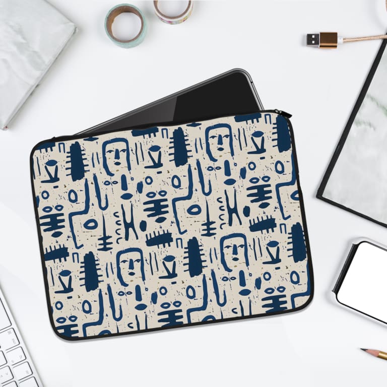 Blue abstract pattern laptop sleeve with a white background, offering modern style and laptop protection. laptop sleeve kept on a plain white background