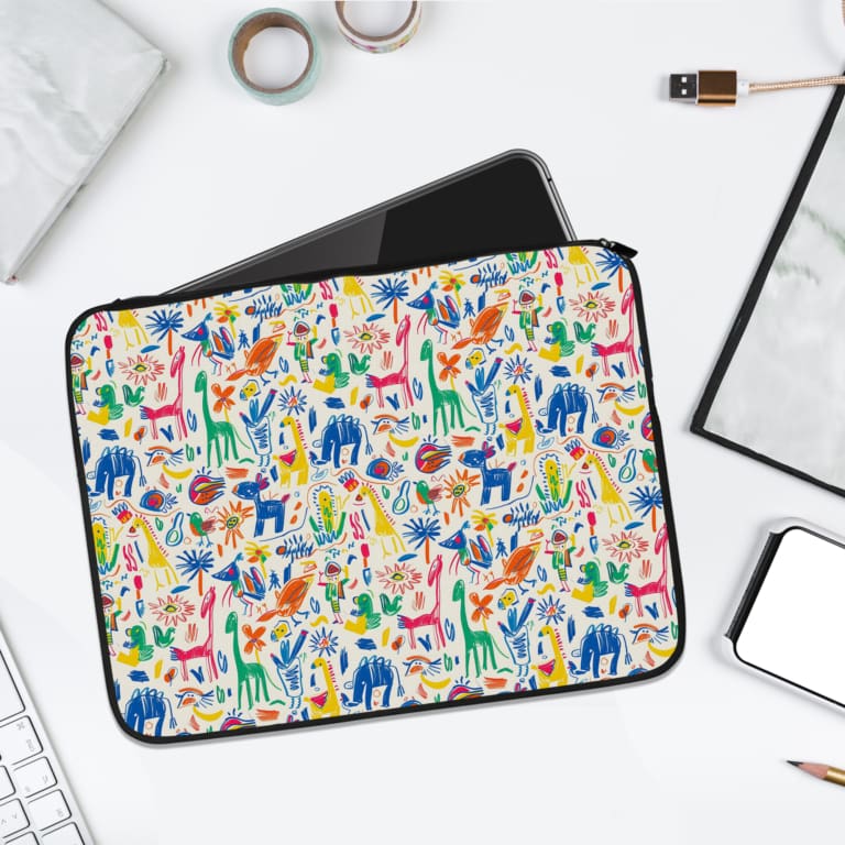 Infidu Colorful Animal Illustration Laptop Sleeve with vibrant animal designs on a white background. laptop sleeve kept on a plain white background