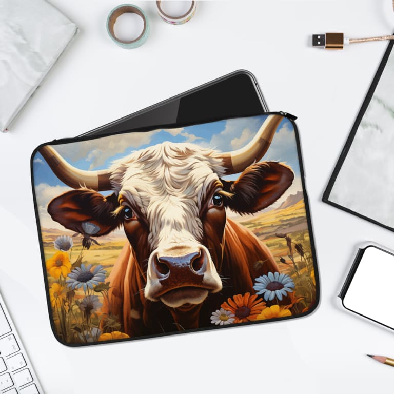 Infidu Vibrant Cow Laptop Sleeve with Sunny Field Design, featuring a cow in a colorful sunny field with daisies and a blue sky. laptop sleeve kept on a plain white background