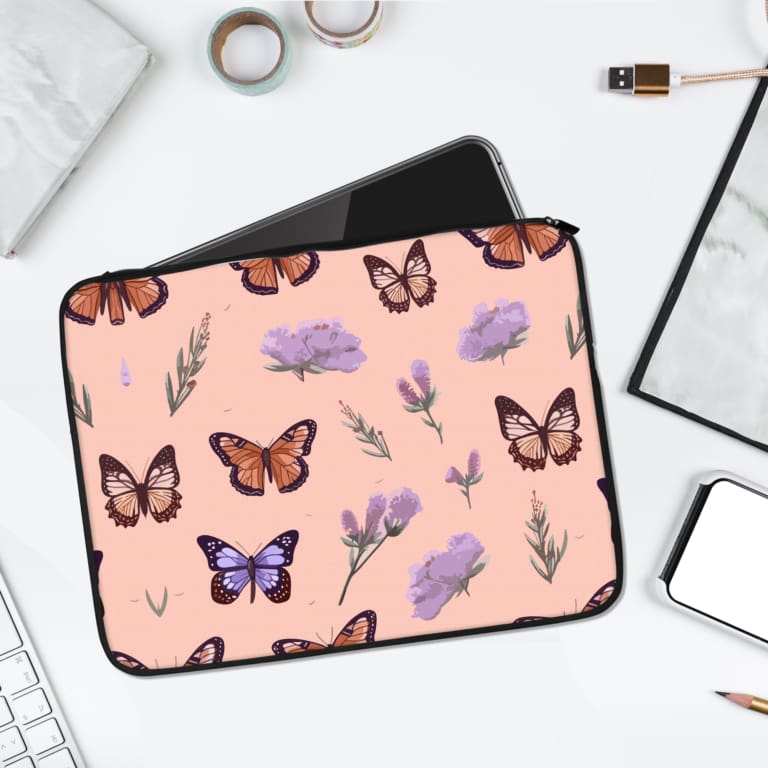 Infidu Soft Pink Butterfly & Floral Laptop Sleeve featuring butterflies, flowers, and a soft pink background, perfect for laptop protection. laptop sleeve kept on a plain white background