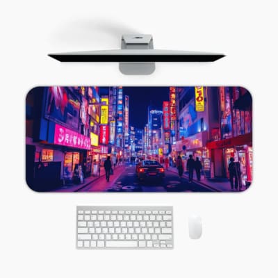 Infidu Neon City Street Desk Pad features a vibrant nighttime city scene with neon lights in pink, purple, yellow, and blue, perfect for any desk setup. A desk pad under the computer