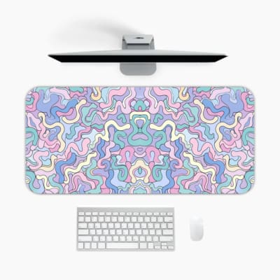 Infidu Colorful Abstract Desk Pad showcasing playful wavy designs in pastel colors on a light background. A desk pad under the computer
