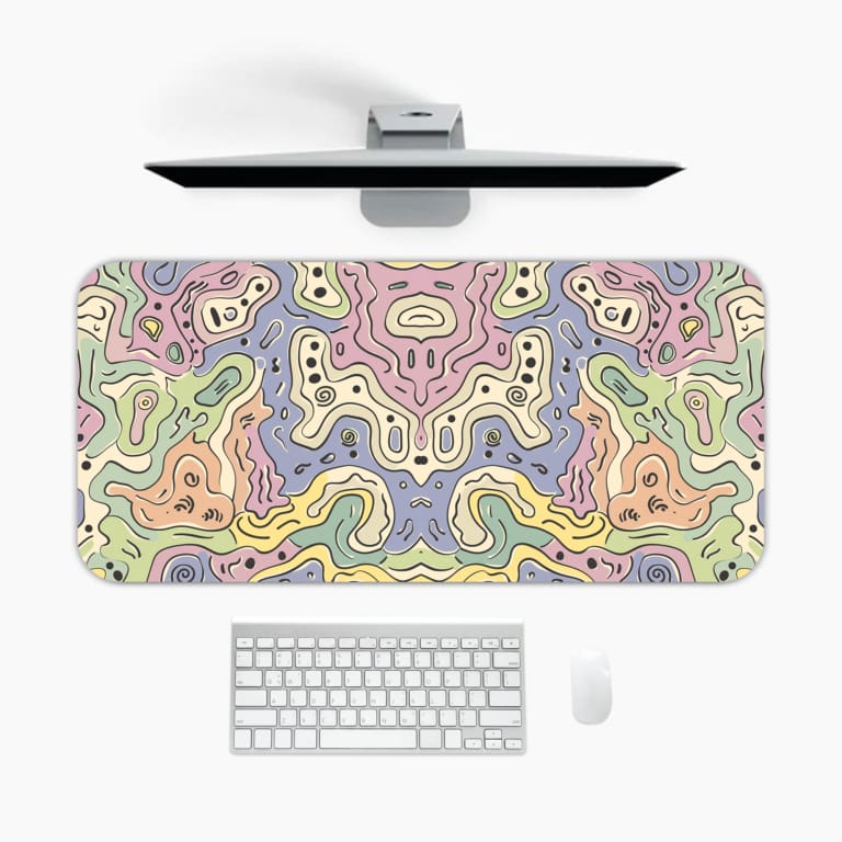 Infidu desk pad showcasing a soft pastel abstract swirling design in purple, pink, blue, green, and yellow for a calming effect. A desk pad under the computer