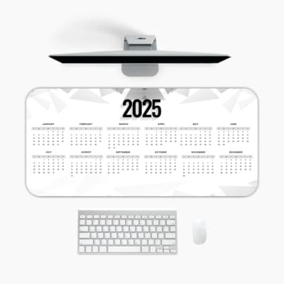 2025 desk pad calendar with light background and simple wave pattern design for easy planning and organization A desk pad under the computer