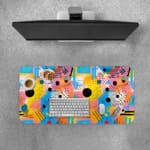 Infidu vibrant geometric desk pad with colorful abstract shapes and yellow background Desk Pad with Keyboard and Mouse on top of the desk pad