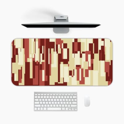 Infidu bold pixel block desk pad with warm red tones and abstract geometric pattern.