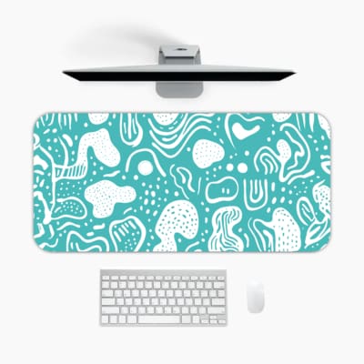 Infidu teal abstract desk pad with playful white pattern on bright background
