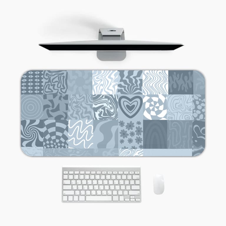 Infidu abstract mosaic desk pad with blue and grey artistic patchwork designs.