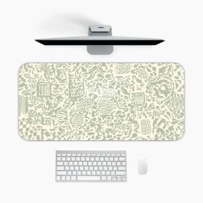 Infidu desk pad with light green abstract doodle design on cream background, featuring playful shapes, lines, and artistic elements.