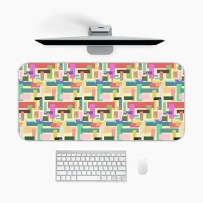 Colorful abstract block pattern desk pad in pastel and bright tones with a playful vintage art design.