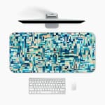 Infidu modern geometric desk pad with cool shades of blue, teal, and beige in a mosaic pattern on a white background.