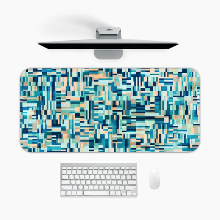 Infidu modern geometric desk pad with cool shades of blue, teal, and beige in a mosaic pattern on a white background.