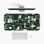 Infidu desk pad with forest green tech-inspired geometric design and vintage art influence