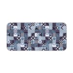 Infidu desk pad with bold geometric shapes in cool tones of blue, black, white, and purple.