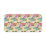 Colorful abstract block pattern desk pad in pastel and bright tones with a playful vintage art design.
