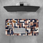 Infidu desk pad with navy and neutral geometric block pattern on white background.