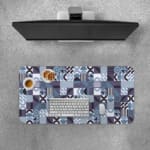 Infidu desk pad with bold geometric shapes in cool tones of blue, black, white, and purple.