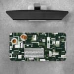 Infidu desk pad with forest green tech-inspired geometric design and vintage art influence