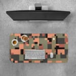 Infidu pixel camouflage desk pad in earthy green, orange, and brown tones