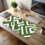 Infidu desk pad with bold white maze pattern on deep green background, inspired by vintage art and wall décor.